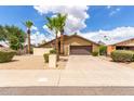 Charming single-story home with well-maintained landscaping and a two-car garage at 2644 E Sylvia St, Phoenix, AZ 85032