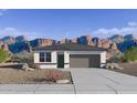 Charming single-story home boasting a two-car garage and mountain views, perfect for serene living at 4927 S 106Th Ave, Tolleson, AZ 85353