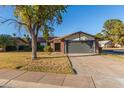 Charming single story home features a brick facade, two car garage, and drought resistant landscaping at 540 Leisure World --, Mesa, AZ 85206