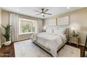 Serene bedroom with bay window, plush carpet, and neutral color palette at 7725 N Via De Fonda --, Scottsdale, AZ 85258
