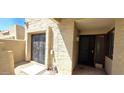 Private courtyard patio featuring gated entry and providing additional security at 16609 N 29Th Dr, Phoenix, AZ 85053