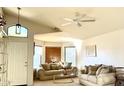 Bright living room with high ceilings, neutral walls, carpet flooring and an abundance of natural light at 4643 E Cherry Hills Dr, Chandler, AZ 85249