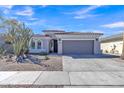 Charming single-story home featuring desert landscaping and a spacious two-car garage at 877 E La Costa Pl, Chandler, AZ 85249