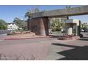 Welcoming entrance to Renaissance Park with decorative flowers and well-maintained landscaping, creating a pleasant arrival at 101 N 7Th St # 107, Phoenix, AZ 85034