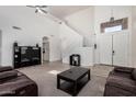 Spacious living room boasts high ceilings, a staircase, and ample natural light at 3875 E Juanita Ave, Gilbert, AZ 85234