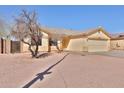 Beige single-story home with a desert landscape at 516 N Emery --, Mesa, AZ 85207