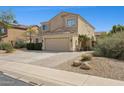 Beautiful two-story home featuring an attached garage and low-maintenance landscaping at 5309 W Angela Dr, Glendale, AZ 85308