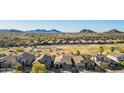 Beautiful aerial view of the community showing mountain views, desert landscaping, and community green spaces at 29794 N Little Leaf Dr, San Tan Valley, AZ 85143