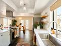 Open kitchen with stainless steel appliances and fixtures, connecting seamlessly to the dining area at 37801 N Cave Creek Rd # 11, Cave Creek, AZ 85331