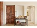 Inviting entryway featuring built-in storage and decorative niches at 40627 N 6Th Ave, Phoenix, AZ 85086