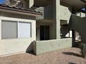 Exterior home image showcasing neutral color and private back patio area at 1825 W Ray Rd # 1058, Chandler, AZ 85224