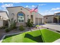 Attractive single-Gathering home with a lush garden, neat turf, and a convenient two-car garage at 21387 W Meadowbrook Ave, Buckeye, AZ 85396