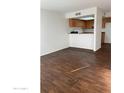 Living room space with luxury flooring and skylight at 3810 N Maryvale Pkwy # 2029, Phoenix, AZ 85031