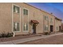 Townhome exterior with dual-pane windows and a tile roof entry at 8226 N 32Nd Dr, Phoenix, AZ 85051