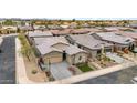Stunning aerial view of a home nestled in a well-maintained neighborhood with desert landscaping at 23434 N 76Th Way, Scottsdale, AZ 85255