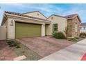 Charming home with an attached garage, brick driveway, and well-maintained landscaping at 3842 E Bartlett Way, Chandler, AZ 85249
