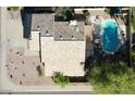 Aerial view of a home with a swimming pool, desert landscaping, and a beautiful tile roof at 53 W Pecan Pl, Tempe, AZ 85284