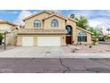 Charming two-story home with a two-car garage, desert landscaping, and a beautiful tile roof at 53 W Pecan Pl, Tempe, AZ 85284