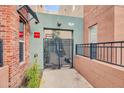 Inviting gated entryway with secured access to residential units above street level at 706 E Washington St # 204, Phoenix, AZ 85034