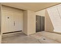 Covered front porch featuring a double-door entrance and a spacious area for outdoor living at 7168 N Via De Amigos --, Scottsdale, AZ 85258