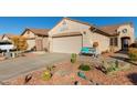 Charming single-story home featuring desert landscaping and a two-car garage at 8205 S Pioneer Ct, Gold Canyon, AZ 85118