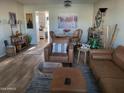 Cozy living room featuring stylish furnishings and natural light at 13807 N Garden Ct Dr, Sun City, AZ 85351