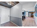 Open foyer with decorative ceiling, tile flooring, and views to the dining and kitchen at 2962 E Dolphin Ave, Mesa, AZ 85204