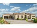 A modern, tan-colored home has a desert landscape, a tile roof, and a stone entryway, with a spacious driveway at 8233 E Camino Adele --, Scottsdale, AZ 85255
