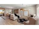 Bright and airy living room featuring stylish furniture and modern decor at 12860 W Junipero Dr, Sun City West, AZ 85375