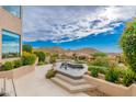 Landscaped exterior view with a water feature and views overlooking the valley at 24350 N Whispering Ridge Way # 22, Scottsdale, AZ 85255