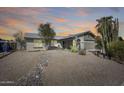 Inviting home with well-kept landscaping, decorative rocks and a charming front entrance at 3325 N Desoto St, Chandler, AZ 85224