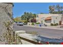 Street view of the home with a well-manicured lawn and desert landscaping in a nice neighborhood at 4705 E Winston Dr, Phoenix, AZ 85044