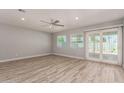 Spacious living room with sliding doors leading to an outdoor patio at 2634 N 52Nd Ave, Phoenix, AZ 85035