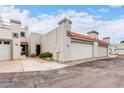 A well maintained exterior featuring desert landscaping and a two-car garage at 4757 W Caron St, Glendale, AZ 85302