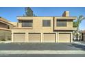 Attractive condo complex featuring multiple garages and well-maintained landscaping at 5122 E Shea Blvd # 1020, Scottsdale, AZ 85254