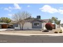 Charming single-story home featuring desert landscaping, and a welcoming appearance at 8201 E Piccadilly Rd, Scottsdale, AZ 85251
