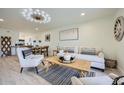 Living space featuring an open floor plan with modern seating and stylish decorative accents at 7430 E Chaparral Rd # A243, Scottsdale, AZ 85250