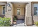 Charming front porch with a welcome mat, address numbers, and a cozy seating area at 10132 E Isleta Ave, Mesa, AZ 85209