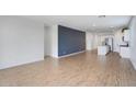 An open-concept living room with tile floors and ample space for entertaining at 11341 E Unger Ave, Mesa, AZ 85212