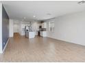 Bright living room with lots of room, tile floors and neutral color scheme at 11341 E Unger Ave, Mesa, AZ 85212