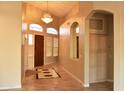 Bright entryway boasting a chandelier and tile flooring at 1490 W Laurel Ave, Gilbert, AZ 85233