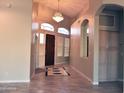 Bright entryway boasting a chandelier and tile flooring at 1490 W Laurel Ave, Gilbert, AZ 85233