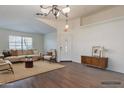 Spacious living room with ample natural light, neutral tones, and wood-style flooring at 1642 E Cardinal Dr, Casa Grande, AZ 85122