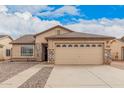 Charming single-story home featuring a two-car garage and low-maintenance desert landscaping at 1775 E Sycamore Rd, Casa Grande, AZ 85122