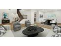 Elegant living area with wood floors, stylish seating, staircase view, and dining area at 6204 S Banning St, Gilbert, AZ 85298
