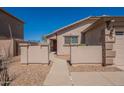 Inviting front entrance with a desert landscape and a walkway leading to the front door at 1374 E Linda Dr, Casa Grande, AZ 85122