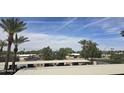 Scenic view of the neighborhood with trees, rooftops, and blue skies at 17404 N 99Th Ave # 214, Sun City, AZ 85373