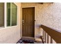 Inviting front entry with decorative door mat and secure smart lock at 520 N Stapley Dr # 286, Mesa, AZ 85203