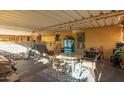 Inviting covered patio with comfortable outdoor seating, a grill, and ample space for entertaining at 711 E Laurel Dr # 17, Casa Grande, AZ 85122