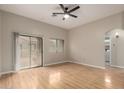 Inviting living room with hardwood floors, fan, and balcony access at 2150 E Bell Rd # 1176, Phoenix, AZ 85022